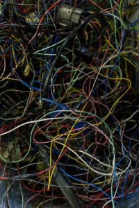 Exposed colored wires entangled